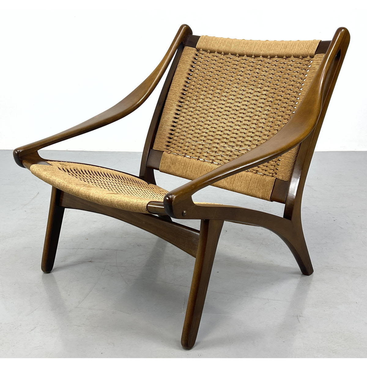 Appraisal: Rare ILLUM WIKKELSO for N Eilersen woven lounge chair Circa