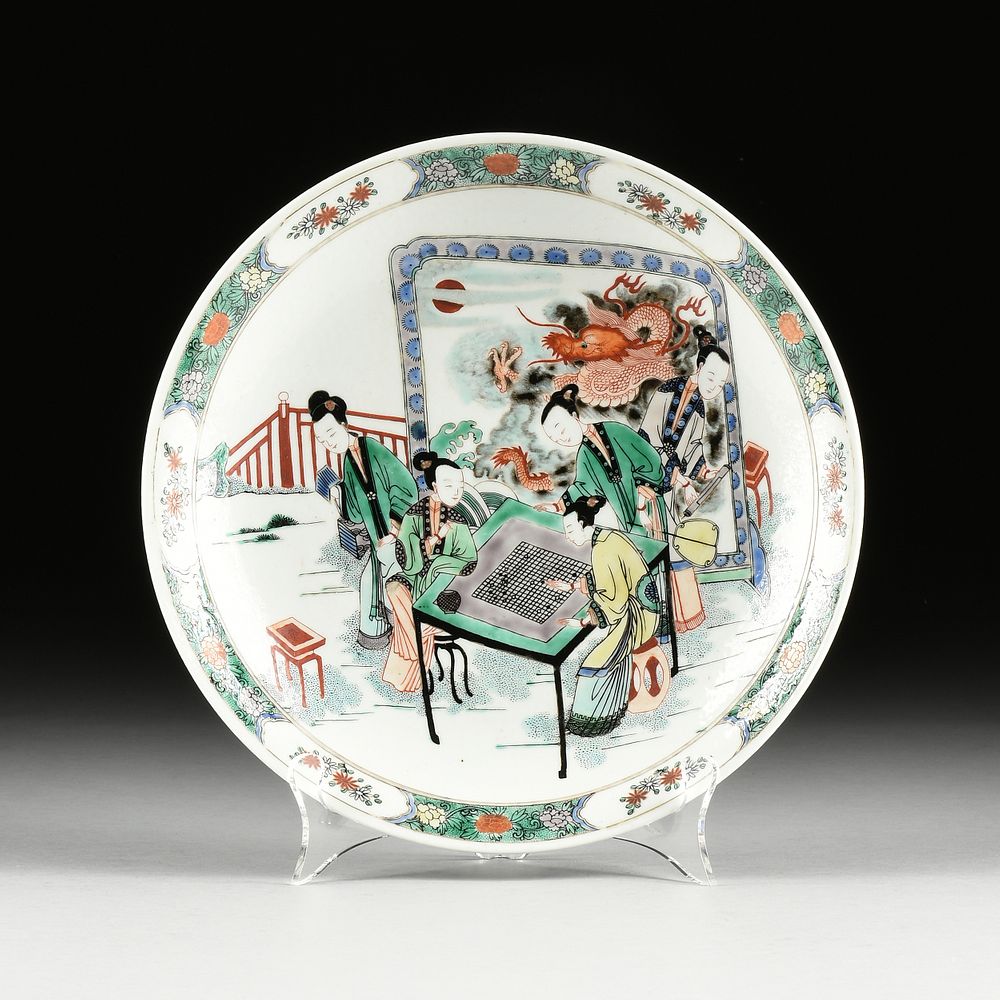 Appraisal: A QING DYNASTY FAMILLE VERTE ENAMELED LEISURE PLATE Ladies Playing