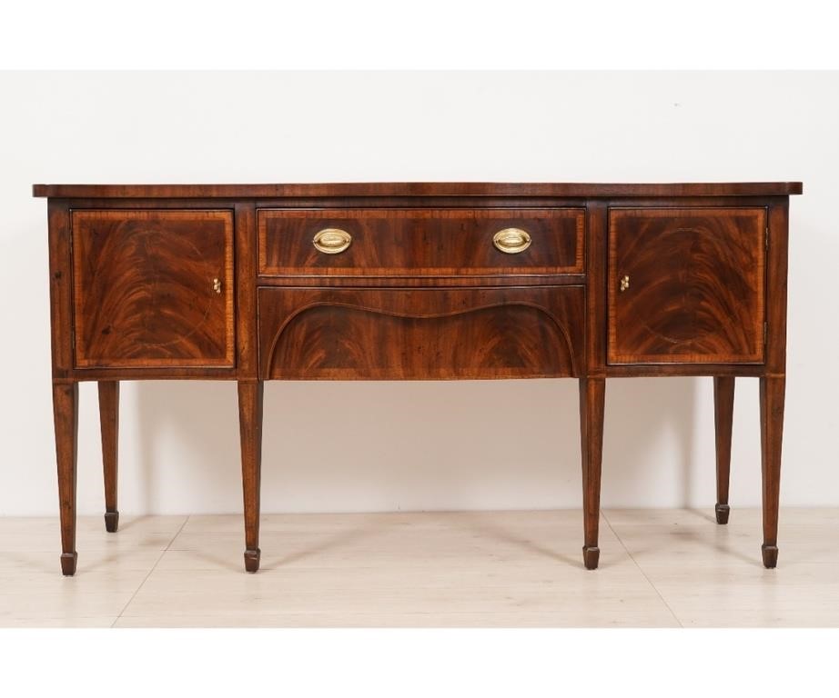 Appraisal: Henredon mahogany sideboard with serpentine shaped top tapered legs and