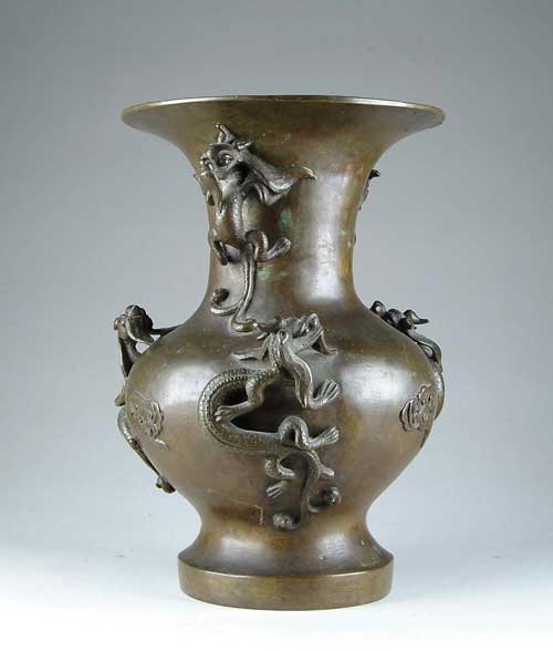 Appraisal: GOOD ANTIQUE ORIENTAL BRONZE WITH DRAGONS Wide flaring rim on