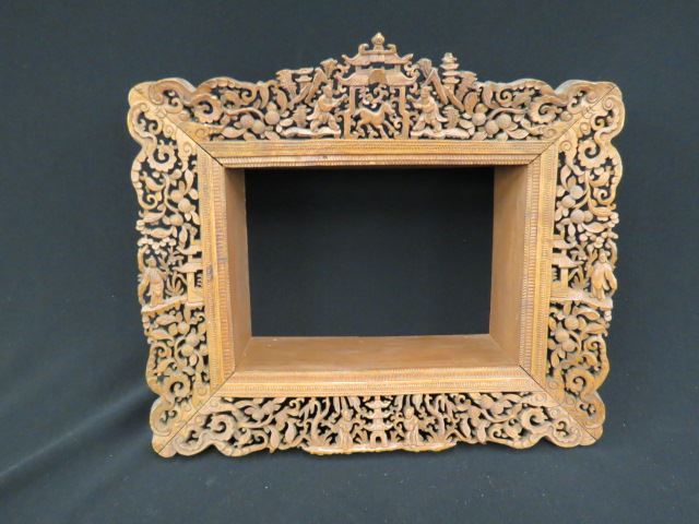 Appraisal: Fine Chinese Carved Wooden Frame deeply carved border has animals