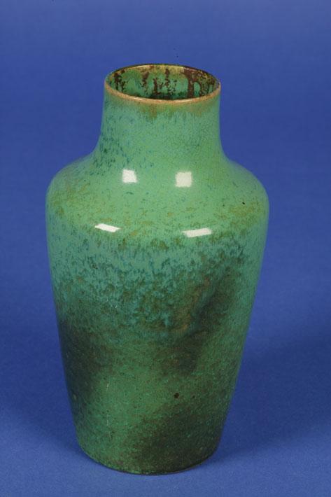 Appraisal: A RUSKIN ART POTTERY VASE of shouldered tapering form with