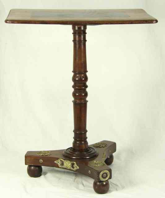 Appraisal: An early th Century occasional table the banded top on