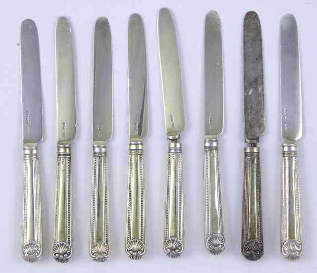 Appraisal: Eight silver table knives London and the filled silver handles