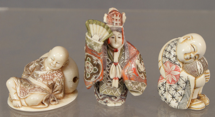 Appraisal: Lot of carved polychromed ivory Netsuke lady with fan damage