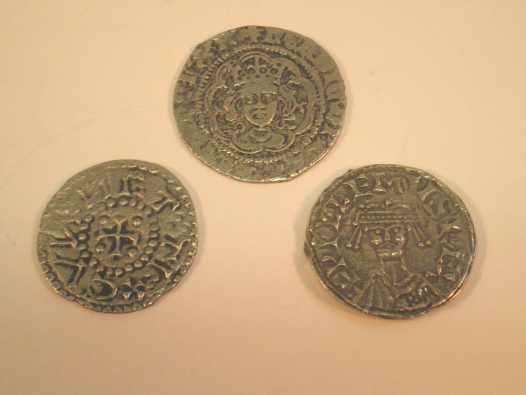 Appraisal: A hammered silver penny type coin and two other silver