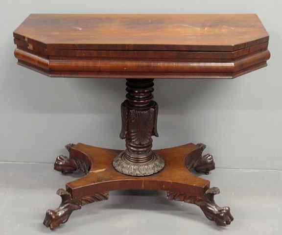 Appraisal: Empire Revival mahogany flip-top card table with an acanthus carved