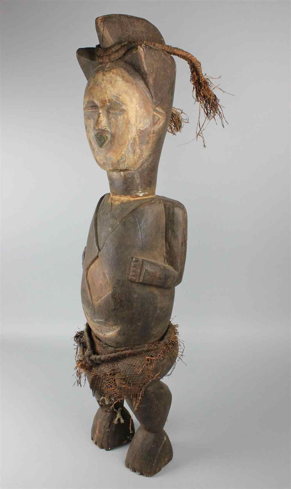 Appraisal: BAULE GHANA CARVING OF A MAN Baule belong to the