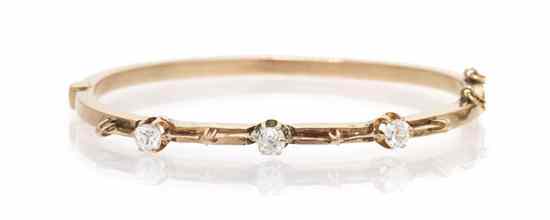 Appraisal: An Antique Yellow Gold and Diamond Bangle Bracelet containing three