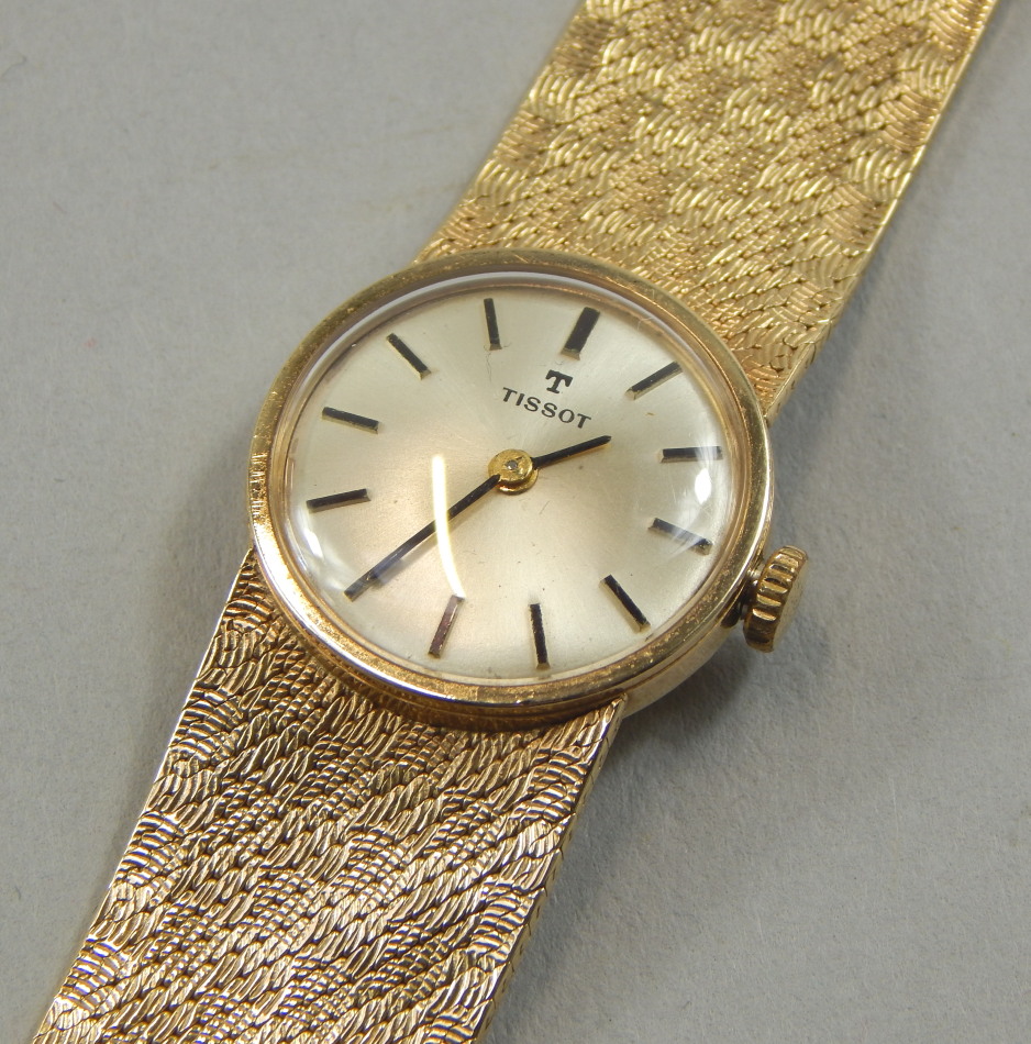 Appraisal: A Tissot ladies wristwatch with circular dial and black hands