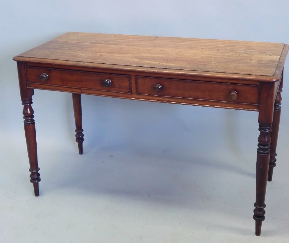 Appraisal: A thC mahogany side table the rectangular top with a