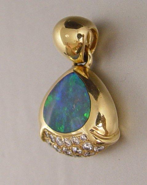 Appraisal: KABANA K BLACK OPAL DOUBLET DIAMOND PENDANT K yellow gold