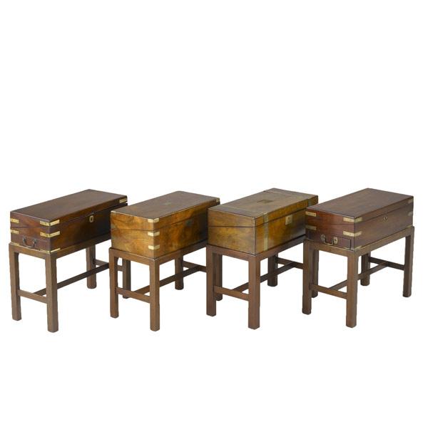 Appraisal: Four English lap desks in mahogany on stands th C