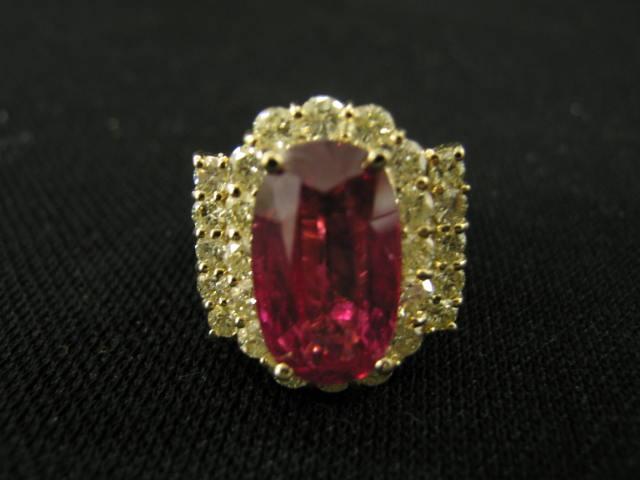 Appraisal: Ruby Diamond Ring carat oval ruby surrounding diamonds totaling carats