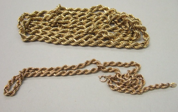 Appraisal: A ct gold ropetwist link long neckchain with a boltring