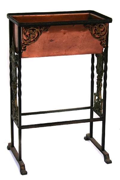 Appraisal: A wrought metal and copper jardiniere on stand height in