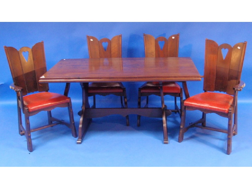 Appraisal: An Arts and Crafts style dining table set of six