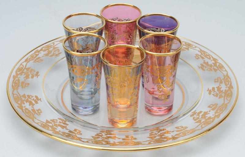 Appraisal: Bohemian Liqueur Set with Shot Glasses Description Multi-colored shot glasses