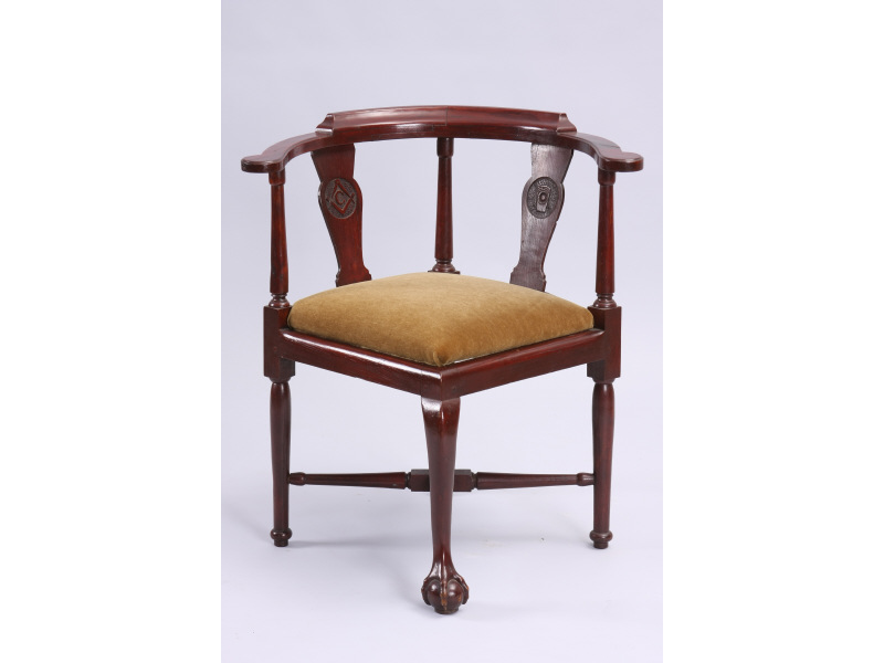 Appraisal: Corner Chair With Masonic Emblems ca mahogany with brown velvet