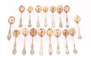 Appraisal: Group of Seashell Mounted Sterling Spoons A group of seventeen