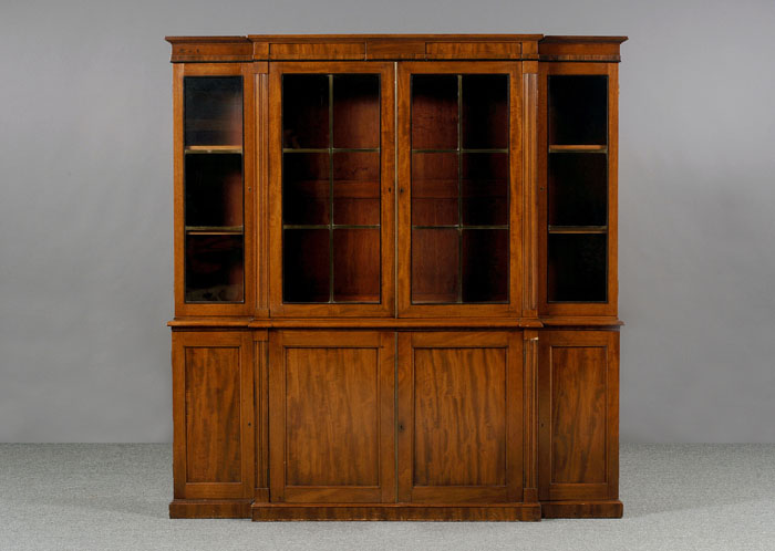 Appraisal: REGENCY INLAID MAHOGANY BREAKFRONT BOOKCASE The molded cornice with panelled