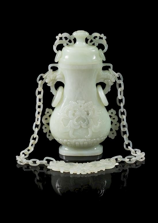 Appraisal: A Celadon Jade Covered Vase Height of vase inches A