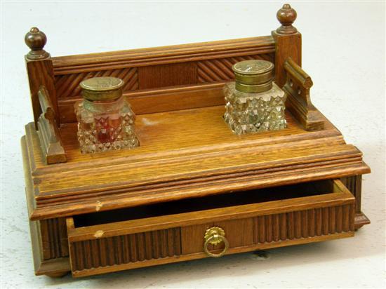 Appraisal: Oak desk stand with twin cut glass inkwells and a