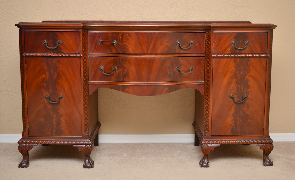 Appraisal: FINCH FINE FURNITURE MAHOGANY SIDEBOARD Serpentine front with carved decoration