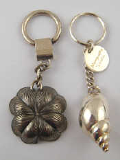 Appraisal: Two key rings one four leaf clover Italian sterling silver