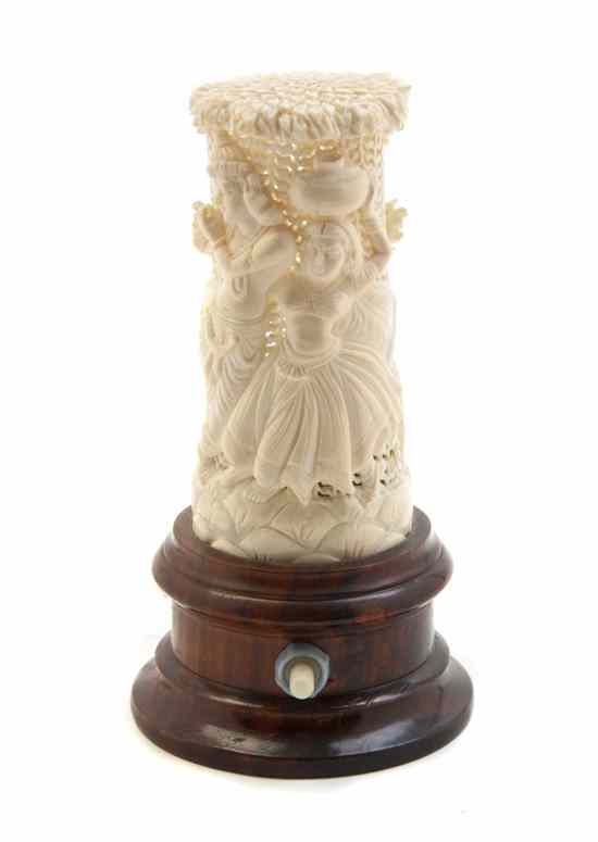 Appraisal: An Indian Carved Ivory Lamp of cylindrical form depicting Krishna