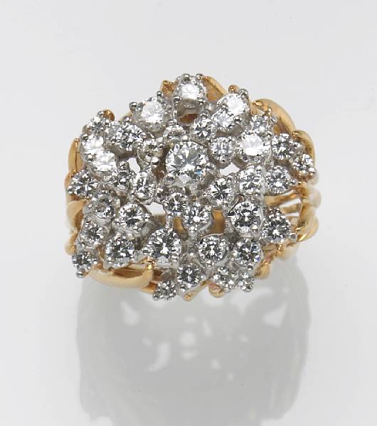 Appraisal: A diamond and k gold cluster ring estimated total diamond