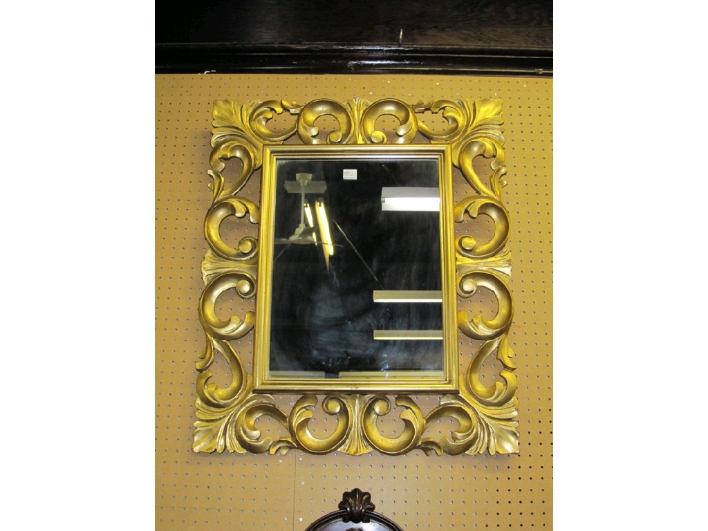 Appraisal: Gilt framed mirror with scrolling decoration