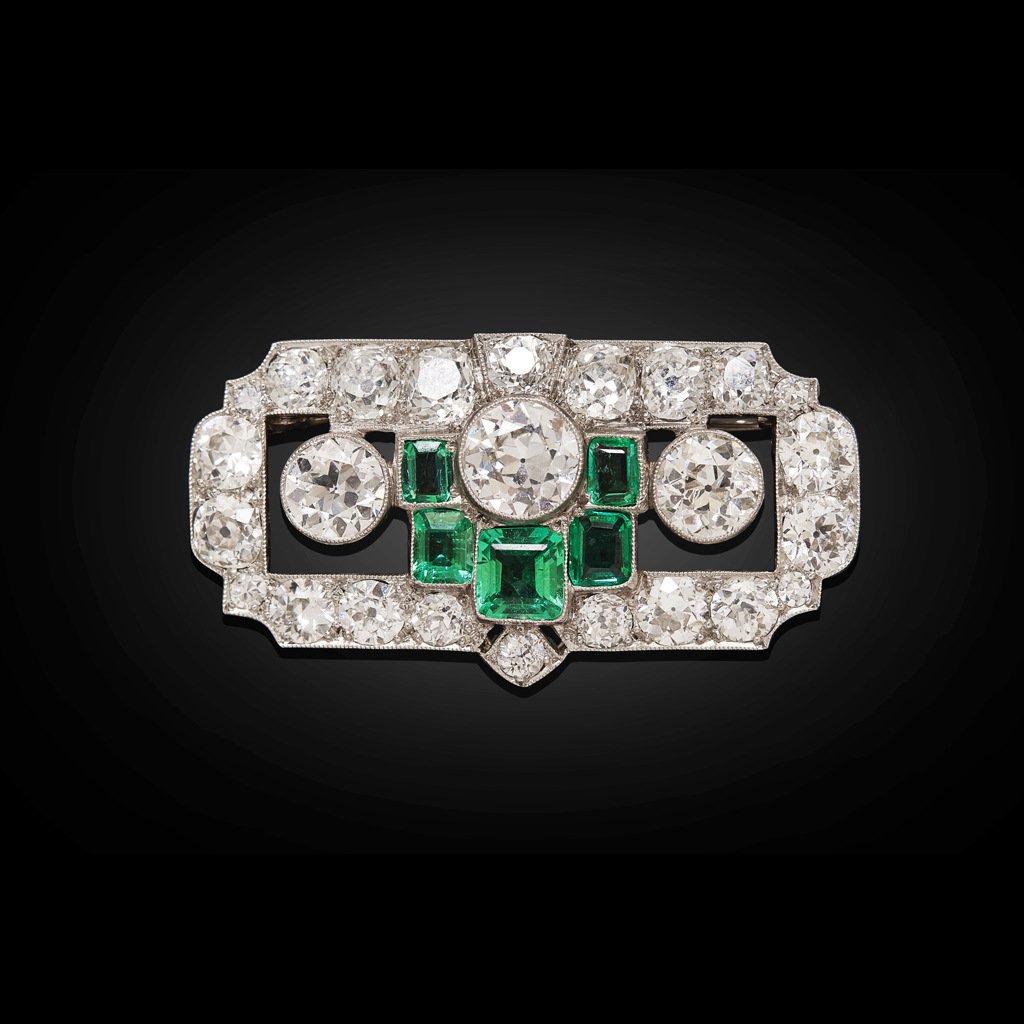 Appraisal: A s emerald and diamond set broochof rectangular geometric design