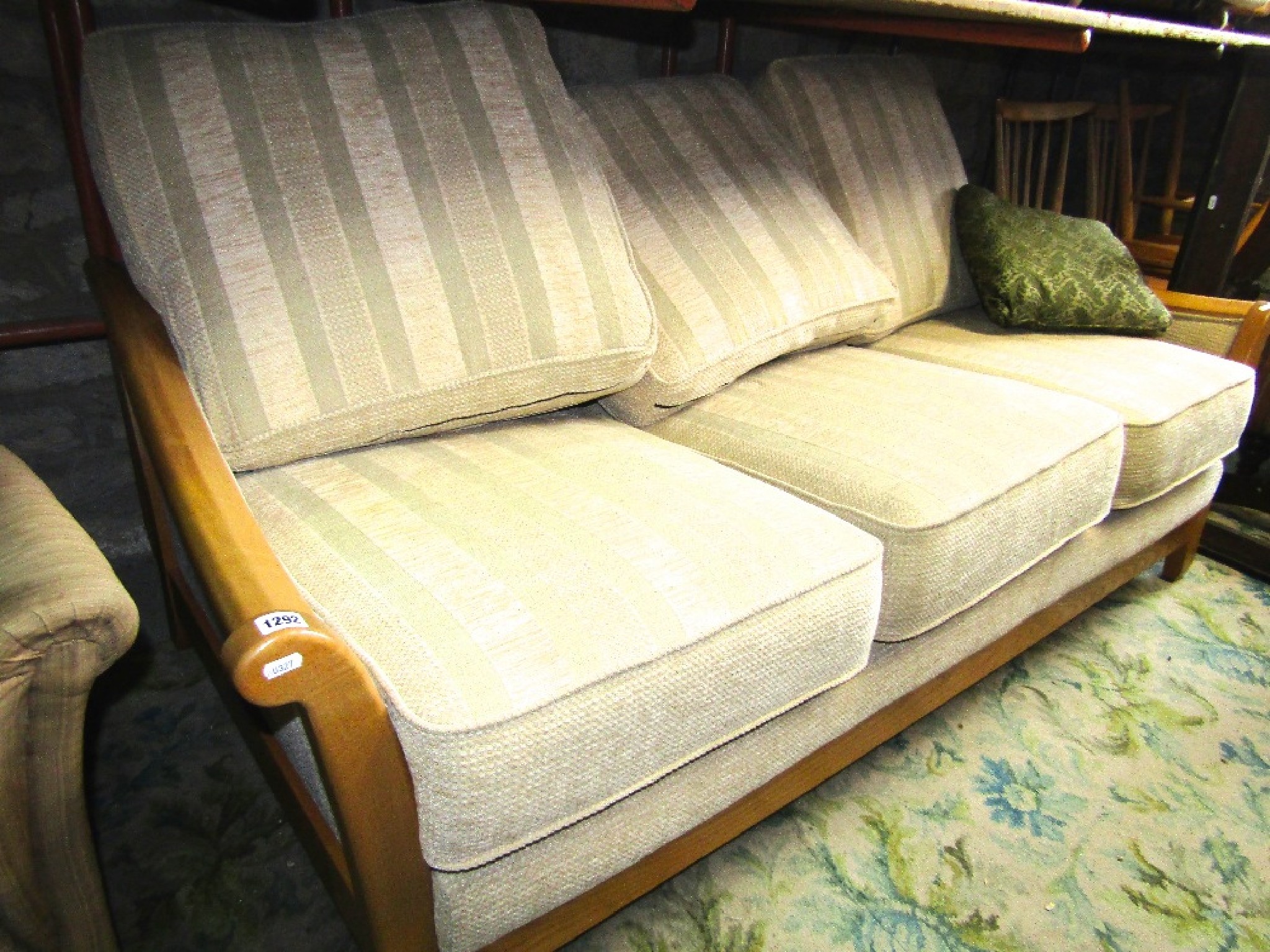 Appraisal: A contemporary three seat sofa the light beechwood frame with