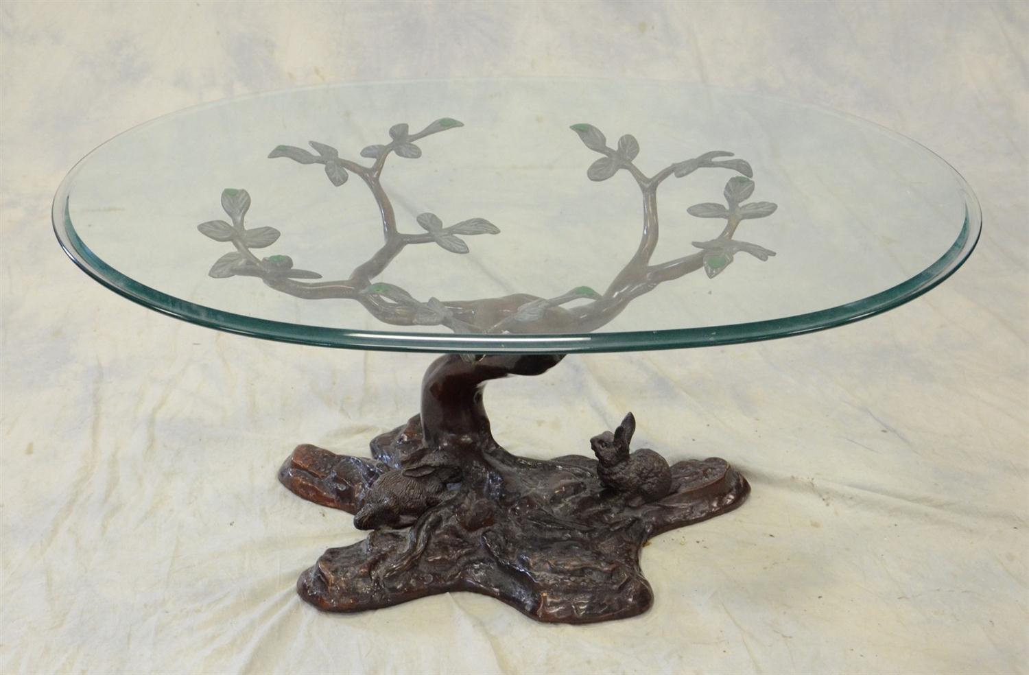 Appraisal: Cast bronze tree form coffee table base with rabbits oval