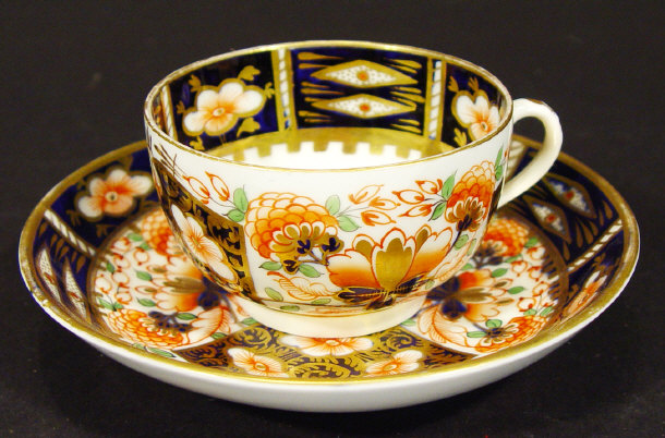 Appraisal: th century Derby china teacup and saucer hand painted in