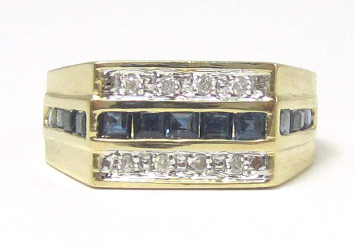 Appraisal: DIAMOND SAPPHIRE AND FOURTEEN KARAT GOLD RING The yellow gold