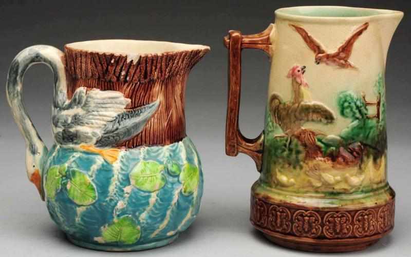 Appraisal: Pair of th Century Majolica Water Pitchers The smallest retains