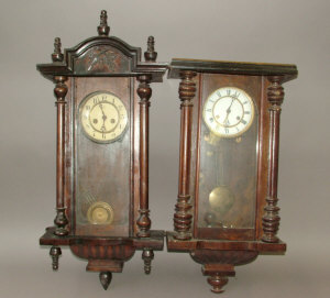 Appraisal: A Continental wooden cased regulator type wall clock of architectural