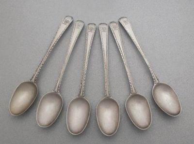 Appraisal: A set of six George III feather-edge teaspoons crested maker