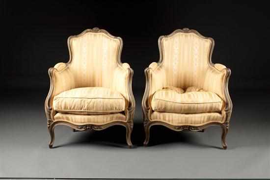 Appraisal: Pair of Louis XV style painted wood upholstered bergeres en