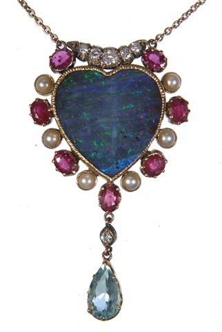 Appraisal: A HEART SHAPED OPAL PENDANT heart shaped opal mounted in