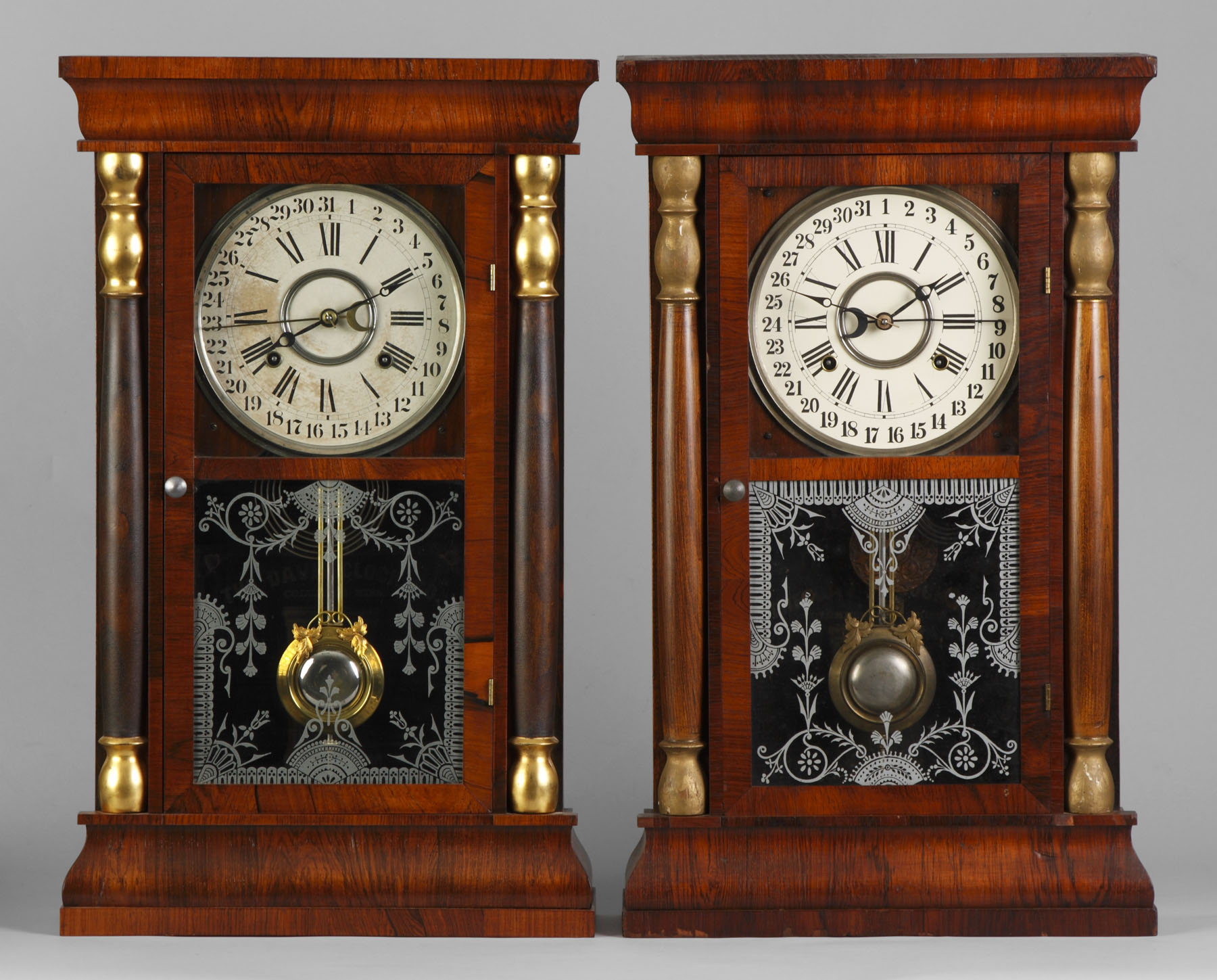 Appraisal: Davis Clock Co Calendar Clock Rosewood veneer cases minor veneer