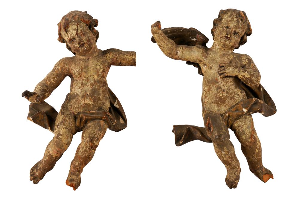 Appraisal: PAIR OF WOOD CARVED CHERUBSCondition with losses to hands fingers