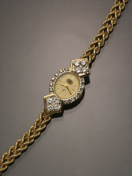 Appraisal: Lady's -Karat Yellow-Gold and Diamond Quartz Wristwatch Swiss Recent Having