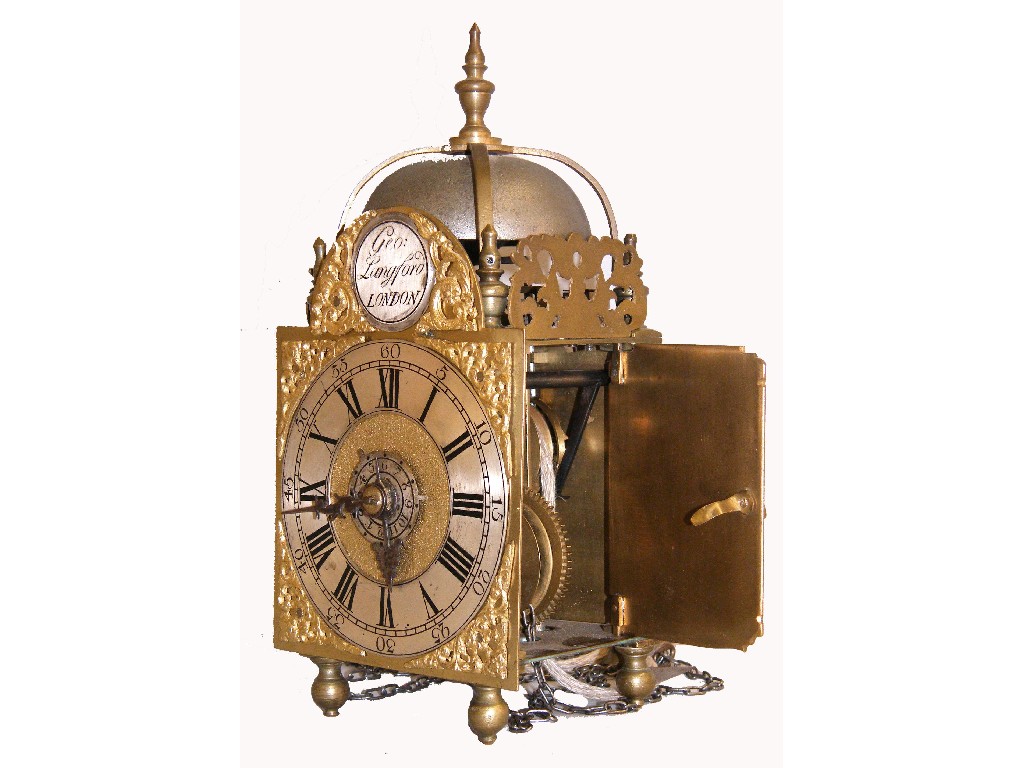 Appraisal: Miniature brass verge lantern clock with alarm the arched dial