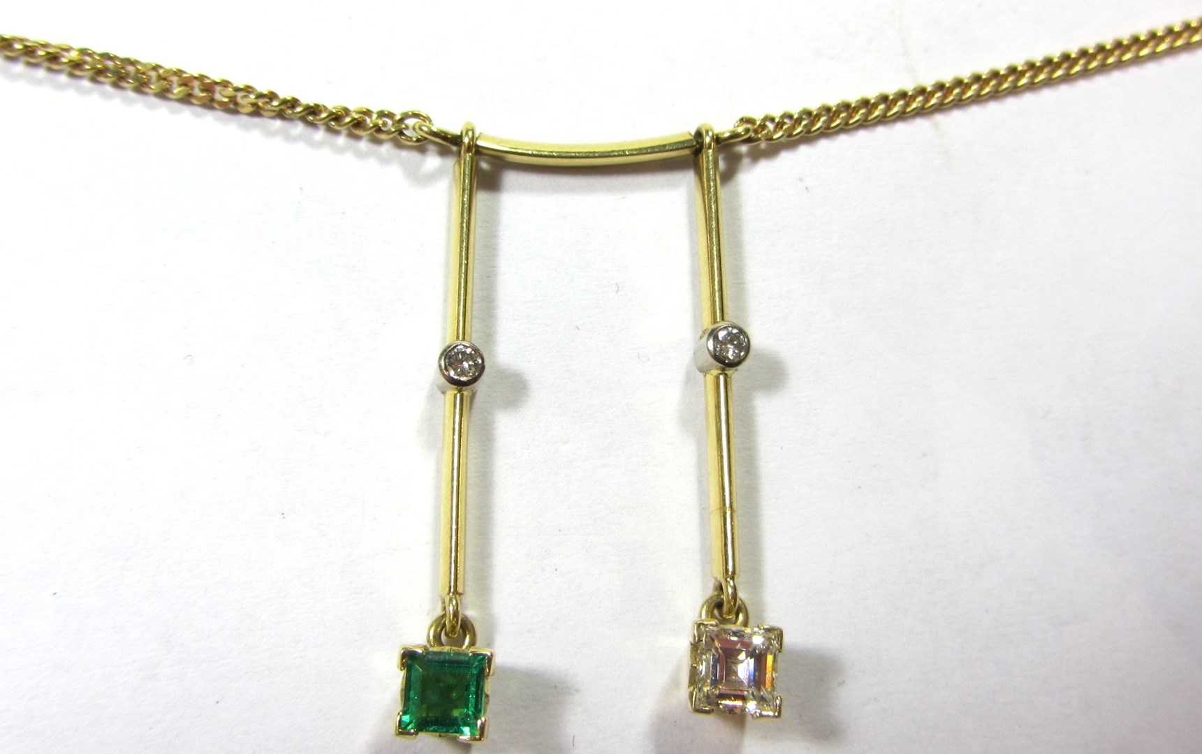 Appraisal: An Italian ct gold emerald and diamond necklace the front