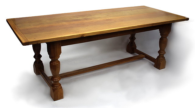 Appraisal: A LIGHT OAK REFECTORY TABLE the rectangular top with framed