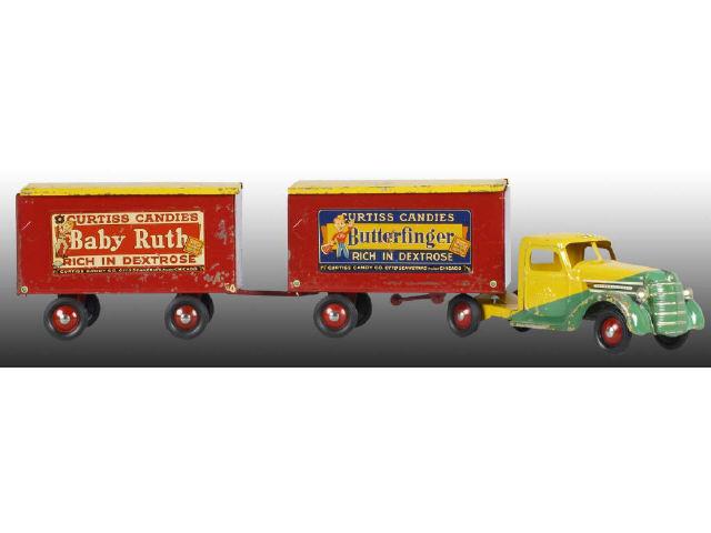 Appraisal: Pressed Steel Baby Ruth Butterfinger Truck Toy Description Two-piece trailer