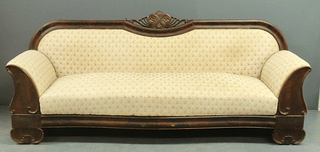 Appraisal: Empire mahogany sofa with a pierced carved crest h x